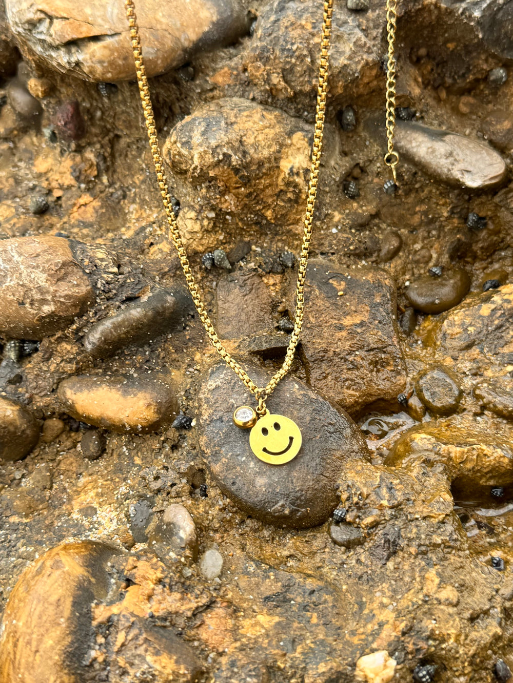 Smiley stone pendant